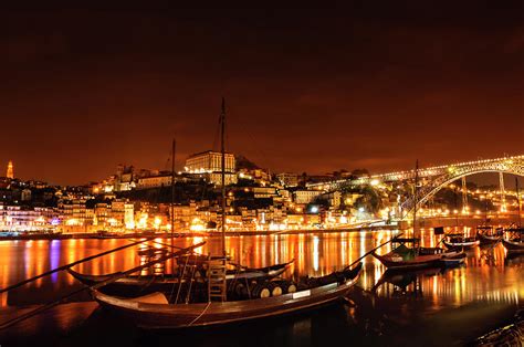 City Of Porto Portugal At Night By Ogphoto