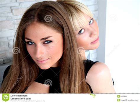 two girls blonde and brunette stock image image of model adults 8093949