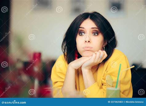 Bored Woman Waiting In A Restaurant Feeling Depressed Stock Image