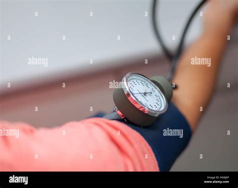 Doctor Checking Blood Pressure Of A Patient Close Up Stock Photo Alamy