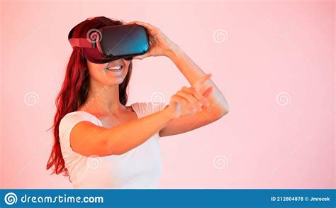 Woman In Virtual Reality Stretching Her Hand And Touching Something