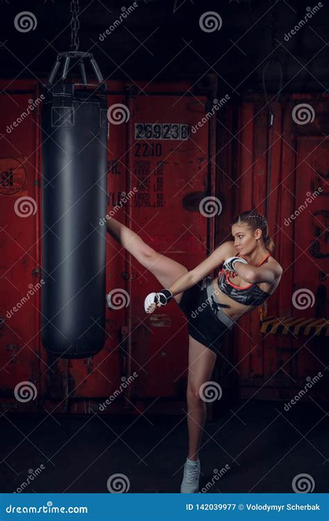 Kickboxing Woman Punching Kicking Bag At The Gym Stock Image Image Of Fitness Karate 142039977