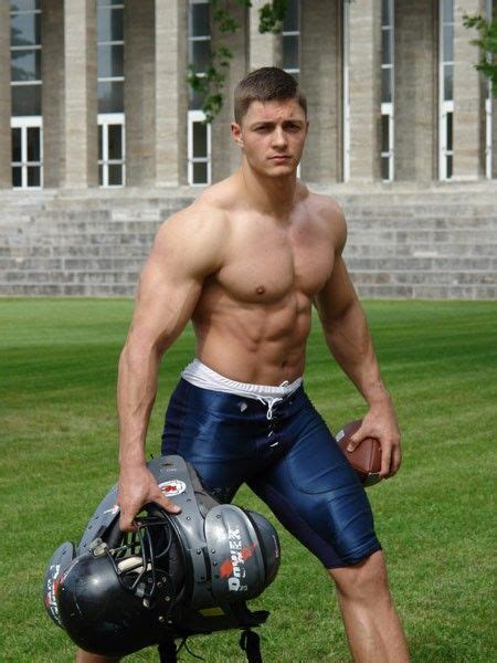 hot muscle football jock shirtless with 6 pack abs carrying gear アメフト ボーイズ ラグビー