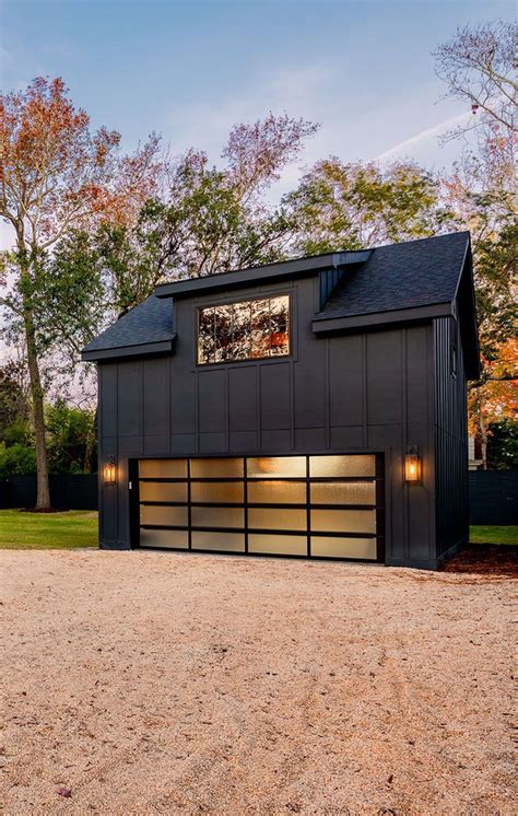 Ultra Modern All Black Detached Garage With Double Wide Door And Living