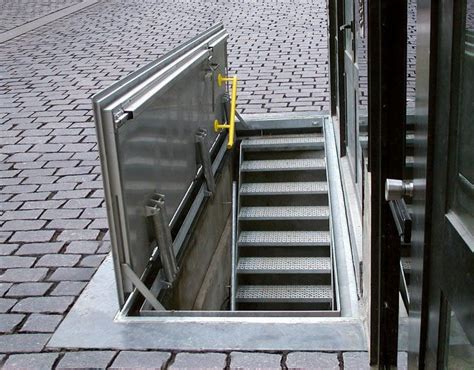 Basement steps basement entrance bilco doors sas entree hatch door deck over deck roof access hatch hatch door basement doors home wine cellars trap door balcony railing attic. https://www.google.es/search?q=puerta sotano horizontal ...