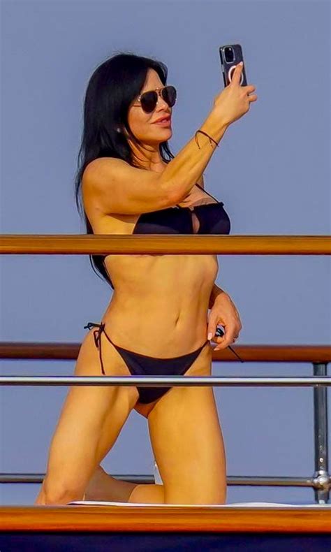 lauren sanchez turns up the heat in black bikini while tanning on deck of 500m yacht