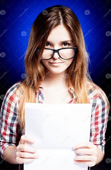 Young Girl With Exercise Book Looking Through The Nerd Glasses Stock