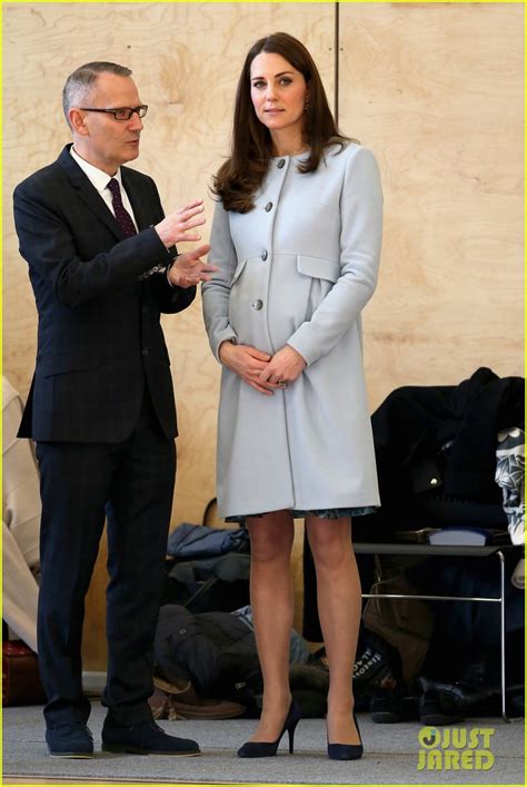 Kate Middleton Cradles Her Growing Baby Bump At The Kensington Leisure