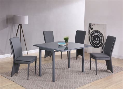 Place it in your kitchen, dining area, or dinette and use it for meals, as a workstation. Matt Grey glass dining table and 4 chairs - Homegenies
