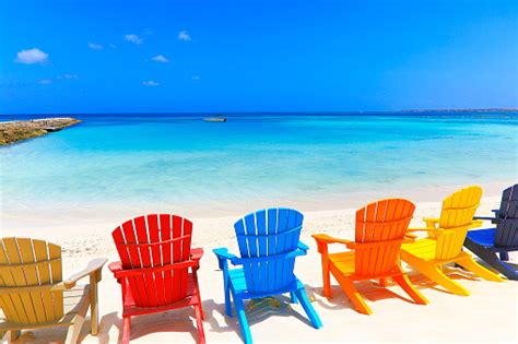 Use them in commercial designs under lifetime, perpetual & worldwide rights. Tropical Turquoise Beach With Colorful Outdoor Adirondack ...