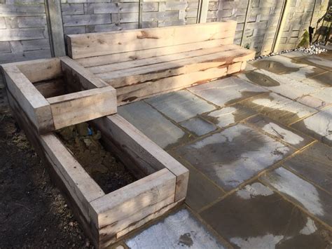 Bespoke Seating Area With Raised Planter Created Using Oak Sleepers