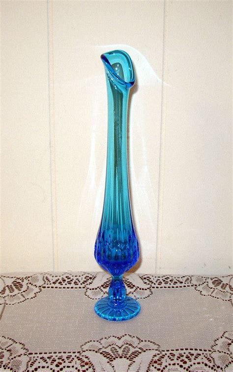 Viking glass vikings glass vase turquoise vases etsy vintage the vikings jars. Vintage Turquoise Blue Art Glass Vase | Etsy | Blue art ...