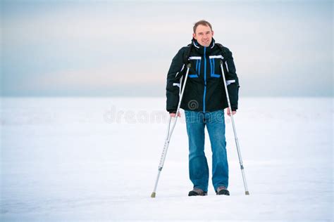 Man With Crutches Walking Outdoors Stock Photo Image Of Orthopaedic