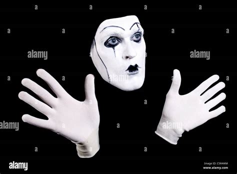 Mime Face And Hands In White Gloves And A Theatrical Make Up Isolated