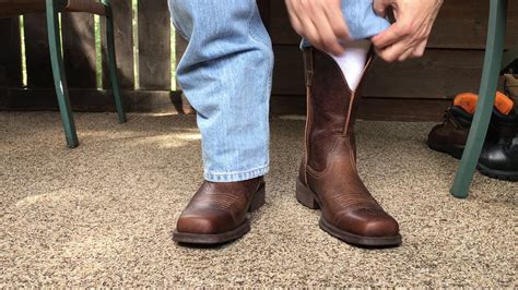 Your boots should fit firm across the instep at the top of your foot, like a solid handshake where shoelaces you may also feel some friction in the ankles. Ariat Rambler Wide Square Toe Western Cowboy Boots - YouTube