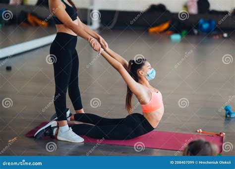 Active Sportive Woman Stretching Young Woman Helping Her Stock Image Image Of Shaping