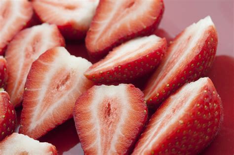 Close Up View Of Halved Strawberries Free Stock Image