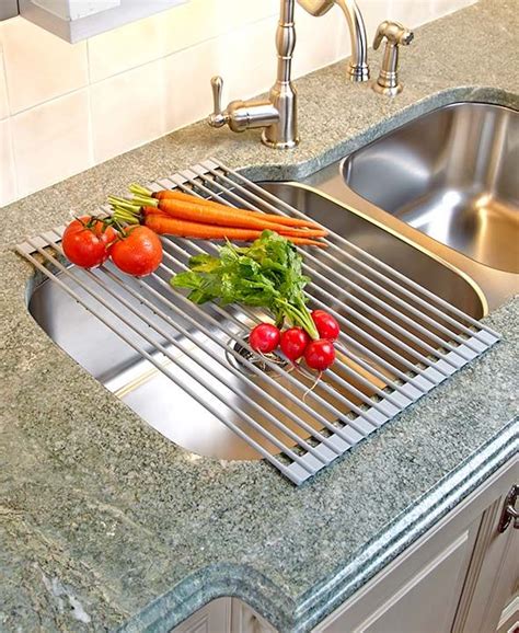 Shelf organizers, risers and cabinet drawers make your spices, kitchen tools and dinnerware easily visible and accessible. Roll-Up Over-the-Sink Dish Drying Rack | Sink drying rack ...