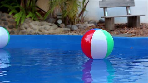 Wasserballon personalized balloon swimming pool balloons in bulk water balloons. Colorful Beach Balls Floating in Stock Footage Video (100% ...