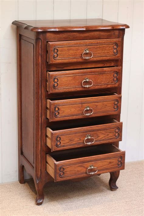 We have a corner pretty much dedicated to her stuff, but the stand for the cage was. Tall Oak Chest Of Drawers | 456380 | Sellingantiques.co.uk