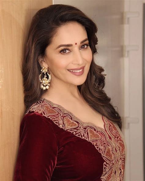 Stunning Glamorous Actress Madhuri Dixit In Red Color Velvet Kurti And