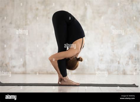 Beautiful Woman Practicing Yoga Uttanasana Standing Forward Bend