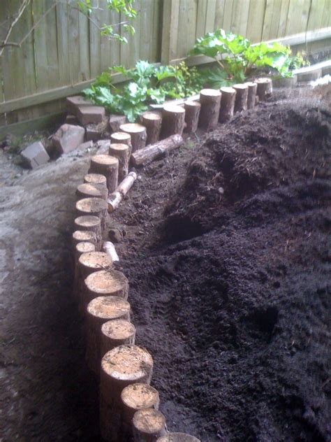 Log Retaining Wall | This little retaining wall was built fr… | Flickr