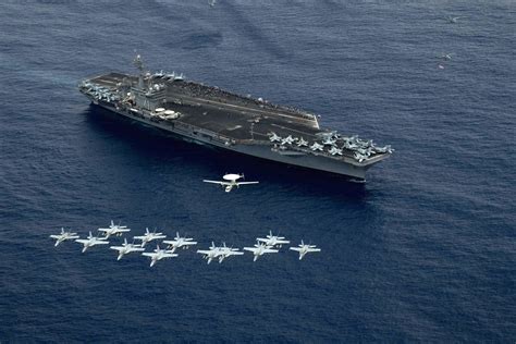 Aircraft Of Carrier Air Wing 17 Fly In Formation Above The Aircraft