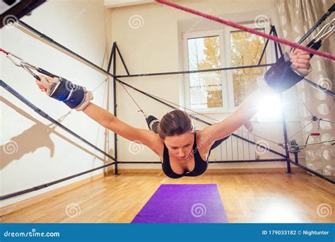 Sporty Young Caucasian Woman Doing Stretching Exercises Of Full Body