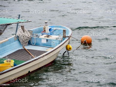 Fishermans Boat Out In The Seas Miyajima Hiroshima Japan Stock Photo