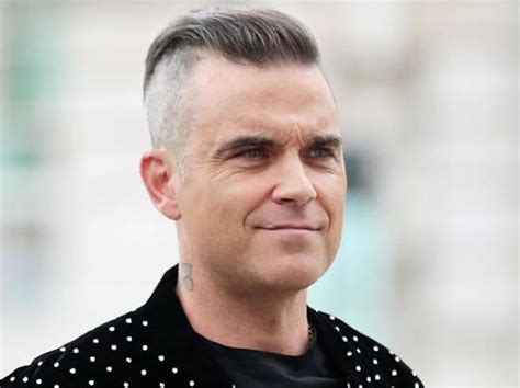 Robbie Williams Admits To Being Delusional About Winning Everything