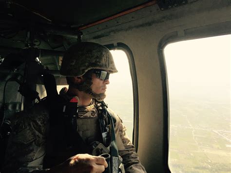Marine recognized for bravery after helicopter crash that killed two airmen
