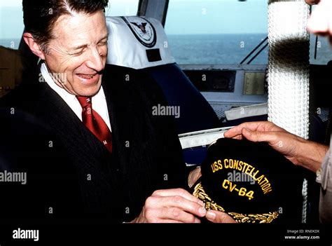 1982 Secretary Of Defense Caspar Weinberger Is Presented With A Ship