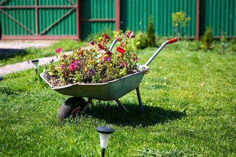 Follow the steps below to learn how to make a wheelbarrow wheel planter. 27 Wheelbarrow Flower Planter Ideas for Your Yard