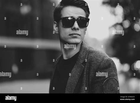 Serious Cool Guy With Sunglasses Walking At Street Stock Photo Alamy