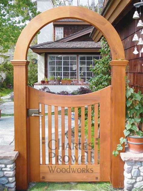Lots of cedar arbor gates to choose from. A garden gate and arch that is also art | Wooden garden ...
