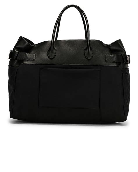 The Row Margaux 17 Inside Out Top Handle Bag In Black Pld Fwrd