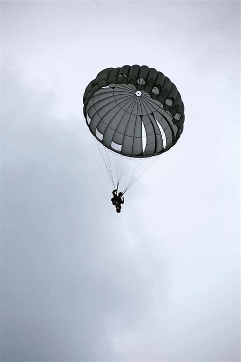 A Us Army Paratrooper Jumps Out Of A C 130 Hercules Picryl Public