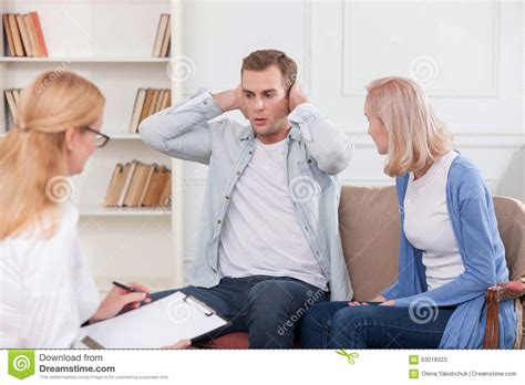 Cheerful Man And Woman Is Visiting Psychologist Stock Image Image Of