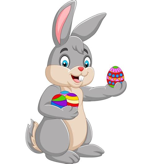 Premium Vector Easter Bunny Holding A Decorated An Egg