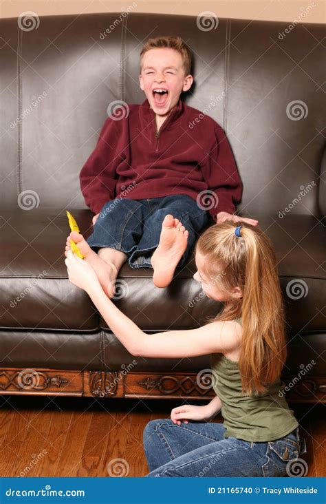Children Tickling Feet With Feather Stock Photo Image Of Brother
