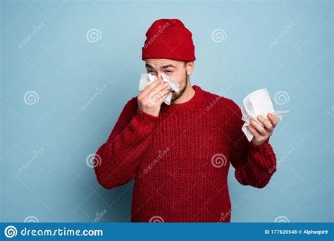 Boy Caught A Cold And Has Cold Chills Studio On Cyan Background Stock