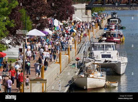Crowds and boats at annual Canalfest Waterford New York flight of five