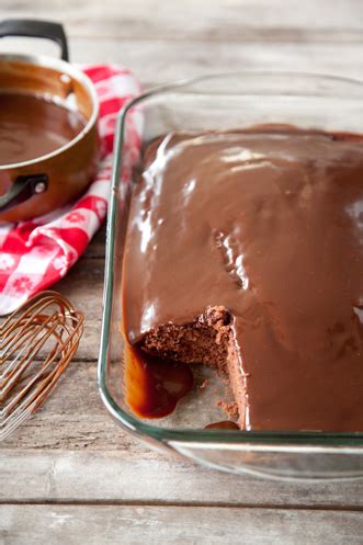 Spread chocolate ganache frosting evenly over top and sides of cake. Savannah Chocolate Cake with Hot Fudge Sauce | Paula Deen