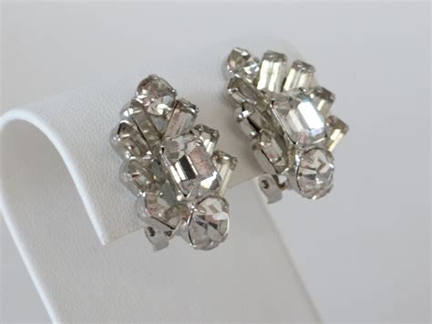 Lovely Clear Rhinestone Clip On Earrings On A Silver Tone Setting