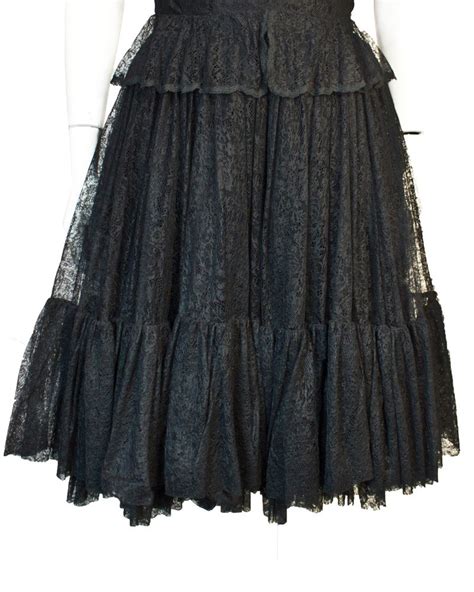 Features vibrant watercolor prints throughout. 1960s Holt Renfrew Black Lace Dress For Sale at 1stdibs