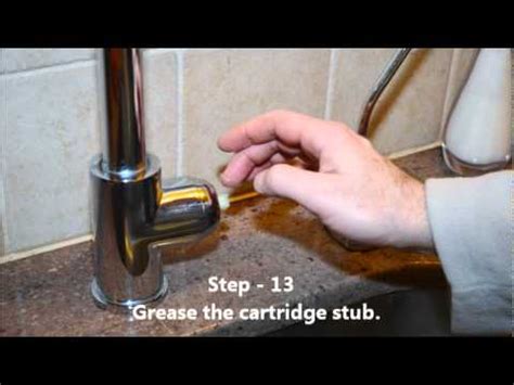 Next, put buckets under the water supply lines, disconnect the lines with an adjustable wrench, and remove the drainpipe with pliers. KRAUS Chrome Kitchen Faucet 1602 Changing the Cardridge ...