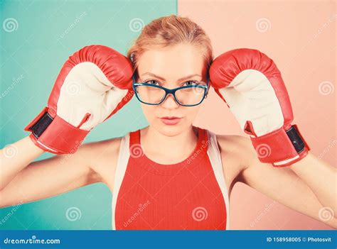 smart and strong woman boxing gloves adjust eyeglasses win with strength or intellect strong