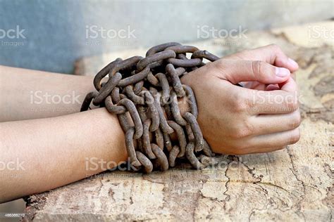 Woman Hands Tied Up With Chain Stock Photo Download Image Now 2015