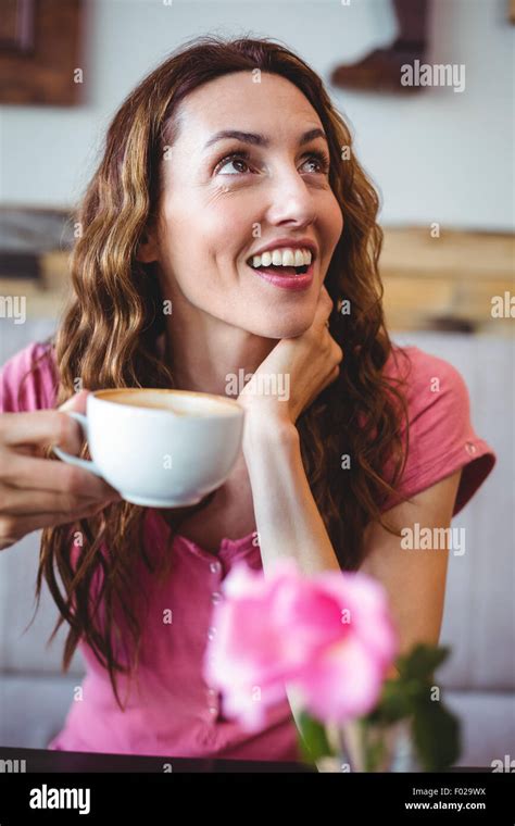 Woman Enjoying Her Cup Of Coffee Stock Photo Alamy